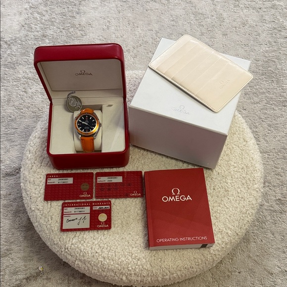 Omega Watch with Vibrant Orange Strap and Black Dial - Picture 13 of 16